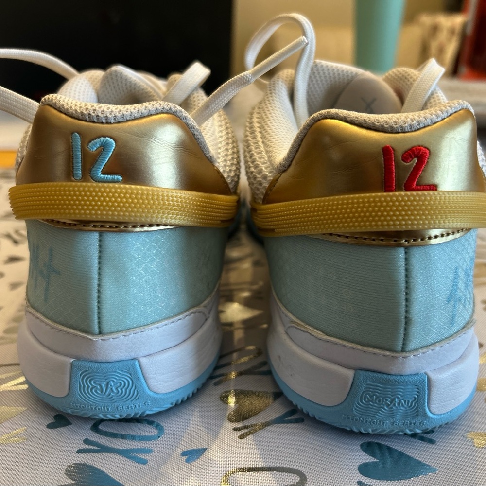 Men’s Nike basketball Gold and Blue Shoes